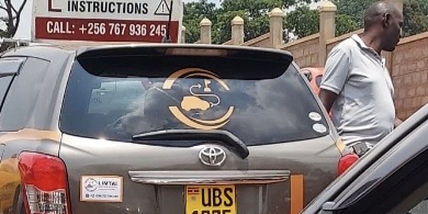 Limtai logo on the rear window of a training vehicle