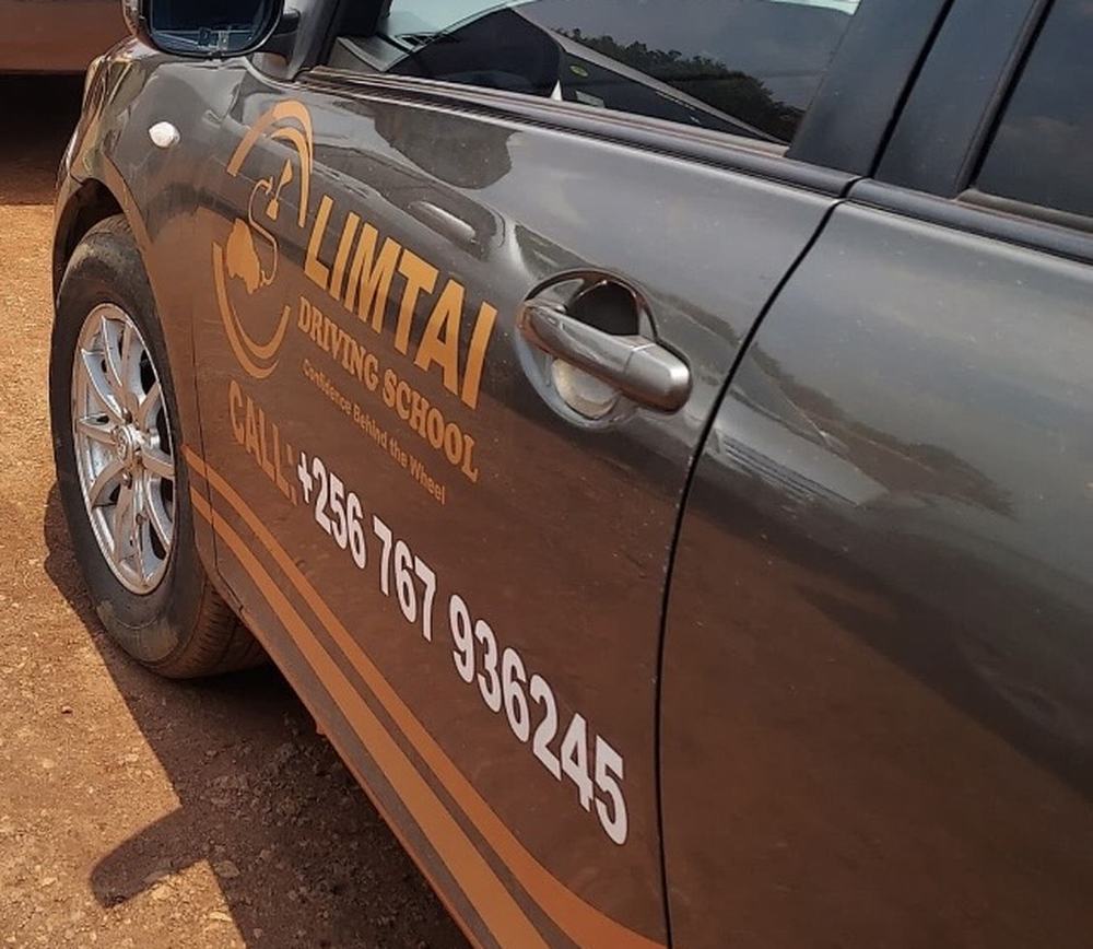Limtai Driving School branding on a training vehicle door